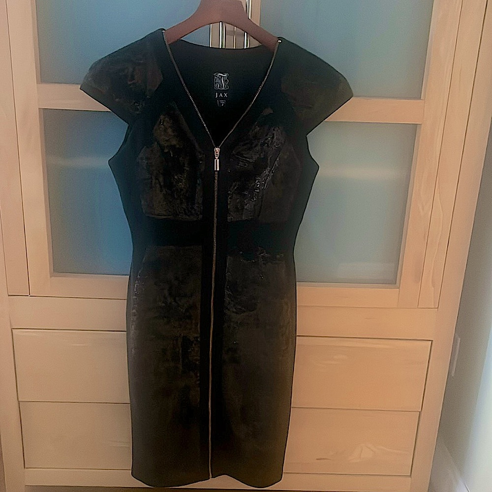 Beautiful black and copper dress. Copper zipper. Worn once. Pristine condition
